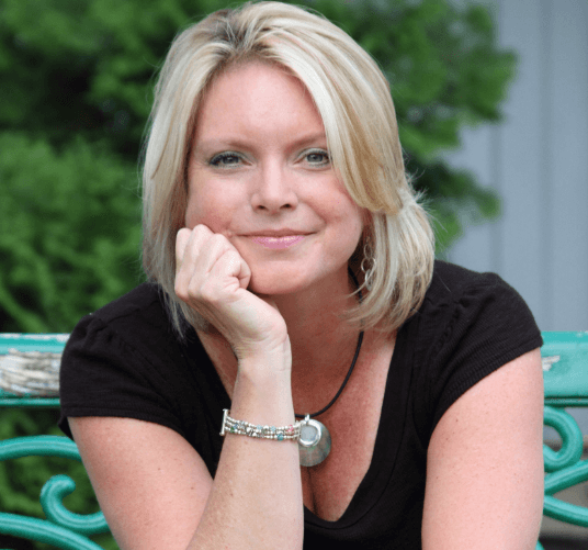 Professional headshot of Melinda Szwak, Senior Performance Coach at The Goodlife Institute.